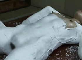 Asian teen mummification in bedaub