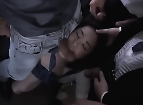 Japanese teen gets fucked on the trainer with a bukkake party