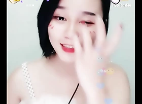Enticing short-haired doll on Uplive
