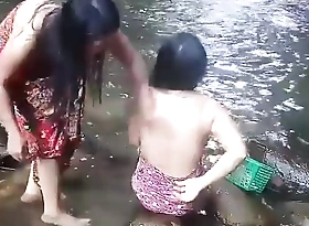 Beautiful girls having bath outdoor