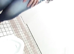 Japanese chick with hairy pussy pisses in a restore b persuade toilet